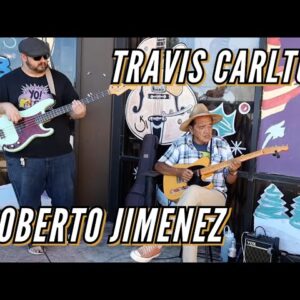 Travis Carlton with Street Musician Robert Jimenez in front of Norman's Rare Guitars