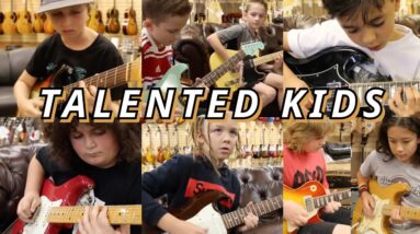 Kids playing guitar at Norman's Rare Guitars Compilation - Part 1